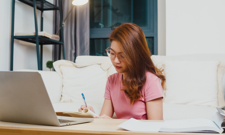 Young Asia Teen Girl Student Distance Learning Lesson With Online Teacher Study Computer Laptop Living Room From Home Night Social Distancing Quarantine Corona Virus Prevention